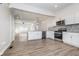Modern kitchen with stainless steel appliances and white cabinets at 730 Sanders St, Indianapolis, IN 46203