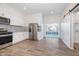 Modern kitchen featuring stainless steel appliances and herringbone backsplash at 730 Sanders St, Indianapolis, IN 46203