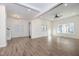Large living room with hardwood floors and lots of natural light at 730 Sanders St, Indianapolis, IN 46203