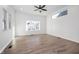 Spacious living room with hardwood floors and large windows at 730 Sanders St, Indianapolis, IN 46203