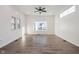 Spacious living room with hardwood floors and large windows at 730 Sanders St, Indianapolis, IN 46203