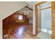 Cozy bonus room with wood paneling and a unique chandelier at 8116 E 900 N, Wilkinson, IN 46186