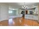Bright and airy living space featuring an open-concept design, wood floors, and a connected living room at 8116 E 900 N, Wilkinson, IN 46186