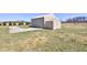 Large storage shed with rolling door in a grassy field at 8116 E 900 N, Wilkinson, IN 46186