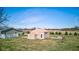 Aerial view of a large storage shed with additional building on rural land at 8116 E 900 N, Wilkinson, IN 46186