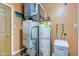 Utility room with essential appliances including a furnace and water heater at 8116 E 900 N, Wilkinson, IN 46186