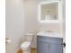 Modern bathroom with gray vanity and LED mirror at 1306 E Minnesota St, Indianapolis, IN 46203