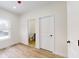 Bright bedroom with wood floors and a private bathroom at 1306 E Minnesota St, Indianapolis, IN 46203