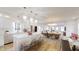 Modern kitchen with white cabinets, large island, and stainless steel appliances at 1306 E Minnesota St, Indianapolis, IN 46203