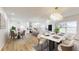 Modern kitchen with white cabinetry, island, and stainless steel appliances at 1306 E Minnesota St, Indianapolis, IN 46203