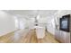 Modern white kitchen with stainless steel appliances and island at 1306 E Minnesota St, Indianapolis, IN 46203