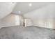 Spacious bonus room with grey carpeting at 1415 N Pershing Ave, Indianapolis, IN 46222