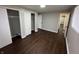 Spacious bedroom with double closets and dark brown flooring at 1801 W Morris St, Indianapolis, IN 46221
