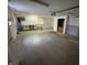Spacious garage with ample storage and workshop area at 1801 W Morris St, Indianapolis, IN 46221