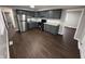 Modern kitchen with dark gray cabinets and granite counters at 1801 W Morris St, Indianapolis, IN 46221