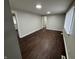 Bright living room featuring hardwood floors and recessed lighting at 1801 W Morris St, Indianapolis, IN 46221