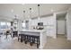 Modern kitchen with white cabinets, stainless steel appliances and an island at 18920 Seaforth Way, Westfield, IN 46074