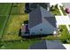 Home's backyard with patio cover and fenced yard at 19243 Foley Dr, Westfield, IN 46074