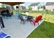 Entertaining backyard patio with fire pit and dining area at 19243 Foley Dr, Westfield, IN 46074