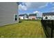 Large backyard with a view of neighboring homes at 19243 Foley Dr, Westfield, IN 46074
