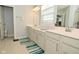 Double vanity bathroom with a large mirror and window at 19243 Foley Dr, Westfield, IN 46074