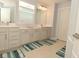 Double vanity bathroom with a large mirror and window at 19243 Foley Dr, Westfield, IN 46074
