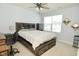 Bright bedroom with a queen bed and built-in desk at 19243 Foley Dr, Westfield, IN 46074