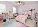 Charming bedroom with purple walls and playful decor at 19243 Foley Dr, Westfield, IN 46074
