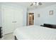 Bedroom with double doors leading to bathroom and window at 19243 Foley Dr, Westfield, IN 46074