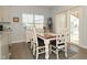 Bright dining area with wooden table and chairs, near sliding door at 19243 Foley Dr, Westfield, IN 46074