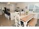 Kitchen and dining area with wooden table and white chairs at 19243 Foley Dr, Westfield, IN 46074