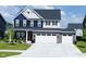 Beautiful two-story home with a two-car garage and manicured lawn at 19243 Foley Dr, Westfield, IN 46074