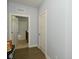 Light-filled hallway with hardwood floors and access to bedrooms at 19243 Foley Dr, Westfield, IN 46074
