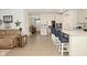 Open concept kitchen with island and breakfast bar, granite countertops at 19243 Foley Dr, Westfield, IN 46074