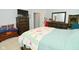Main bedroom with king bed, dresser, and ensuite bathroom at 19243 Foley Dr, Westfield, IN 46074