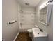 Bathroom with bathtub, shower, and updated vanity at 2116 N Rosewood Ave, Muncie, IN 47304