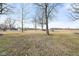 Spacious backyard with large trees and storage shed at 2521 Cicero Rd, Noblesville, IN 46060