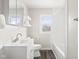 Clean bathroom with white vanity, tub, and tiled shower at 2521 Cicero Rd, Noblesville, IN 46060