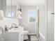 Clean bathroom with white vanity, tub, and tiled shower at 2521 Cicero Rd, Noblesville, IN 46060