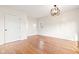 Spacious bedroom with hardwood floors and a large closet at 2521 Cicero Rd, Noblesville, IN 46060