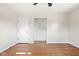 Simple bedroom with hardwood floors and a walk-in closet at 2521 Cicero Rd, Noblesville, IN 46060