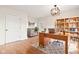 Modern home office with hardwood floors, built-in shelves, and a large desk at 2521 Cicero Rd, Noblesville, IN 46060
