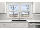Modern kitchen sink with a pull-down faucet and white cabinets at 2521 Cicero Rd, Noblesville, IN 46060