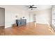 Sunlit living room with hardwood floors and a view to another room at 2521 Cicero Rd, Noblesville, IN 46060