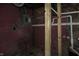 Unfinished basement with electrical panel and plumbing at 3469 N Capitol Ave, Indianapolis, IN 46208