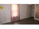Bedroom with hardwood floors, painted wall, and closet at 3469 N Capitol Ave, Indianapolis, IN 46208