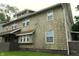 A two-story home with siding and framed windows showing some weathering at 3469 N Capitol Ave, Indianapolis, IN 46208