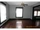 Living room with hardwood floors and ceiling fan at 3469 N Capitol Ave, Indianapolis, IN 46208
