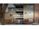 Condo building rear view, showing balconies and patio at 4351 Village Parkway W Cir # 5, Indianapolis, IN 46254