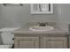 Beige vanity with sink in updated bathroom at 4652 Kimmeridge Ln, Indianapolis, IN 46254